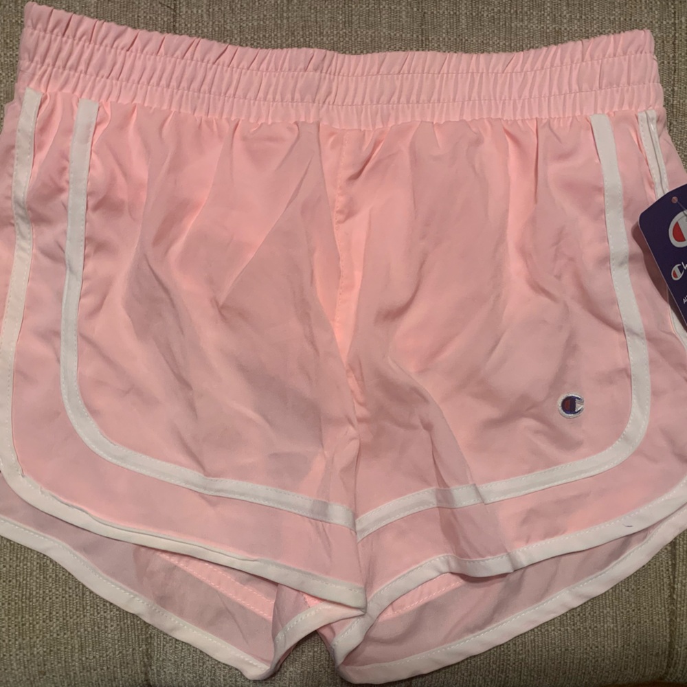 Brand New with tags!! Champion dolphin running shorts. Light pink. Size L